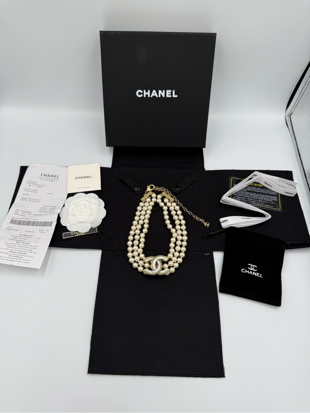 CHANEL Cream Pearl Triple-Strand Necklace with Gold CC Accent